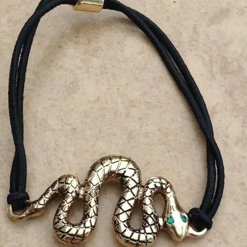 Gold Tone Snake Emerald Eyes Ponytail Bracelet Black