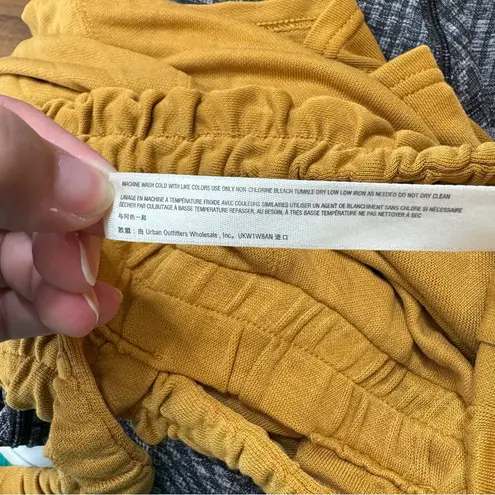 Free People Movement Heart Center Mustard Romper Size Xsmall Gold