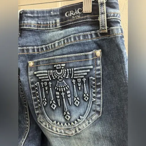 GRACE IN LA 914  mid rise bootcut jeans Size 29 embroidered pockets Cute Jeans