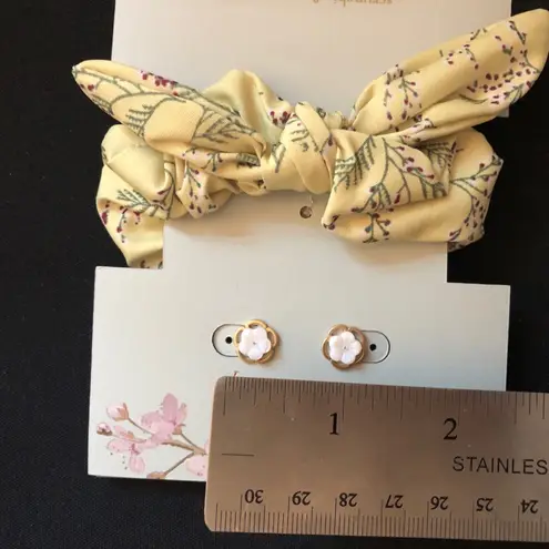 Pink flower stud earrings with matching yellow hair scrunchie