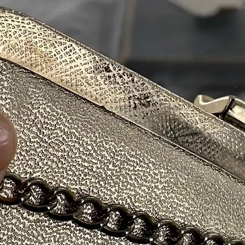 Vintage gold shimmering faux leather glam handbag with tassel. Gold