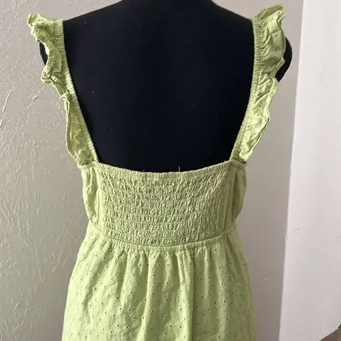 Live to be spoiled like green eyelet smocked cut out ruffle cinched mini dress