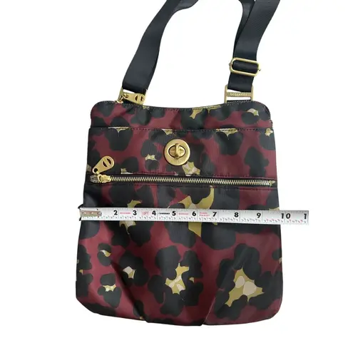 BAGGALINI Burgundy Travel Leopard Print Crossbody Bag