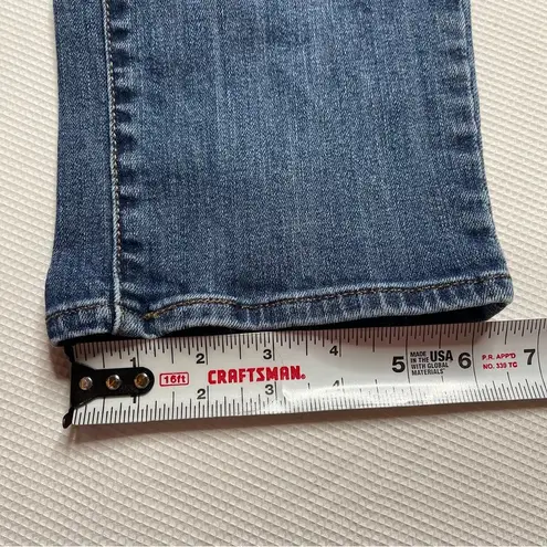 Levi's  Medium Washed Mid Rise Skinny Jeans (31)‎