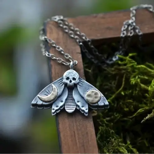 Vintage Style Skull Head With Asymmetric Sun Moon Double Wings Moth Pendant Silver