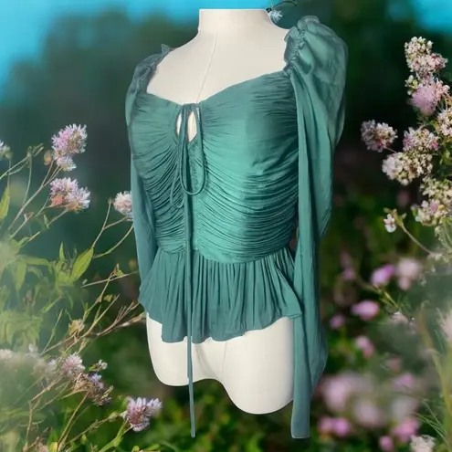 House of Harlow 1960 M
Emerald Green Ruched Peplum Top
Long Sleeve