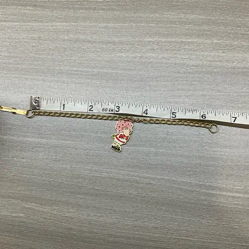 VINTAGE 1980 STRAWBERRY SHORTCAKE BRACELET AND JEWELRY TIN