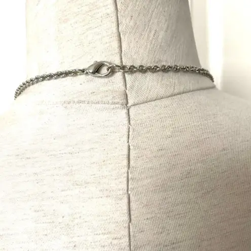 Long silver tone necklace with circles