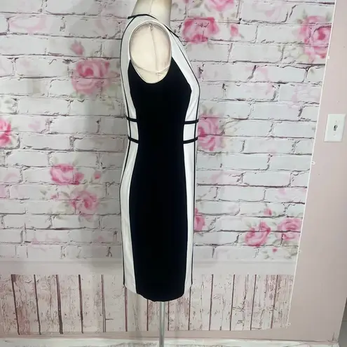 Calvin Klein  nwot sleeveless white sheath dress with black trim and piping