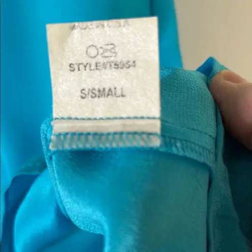 Glam Turquoise Silk Blouse by with Wide Scoop Neck and Short Sleeves