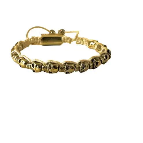 Gold tone skull cord adjustable bracelet