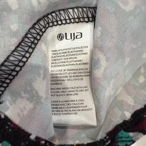 Lija Pindot Swing Printed Tennis Skort Skirt Womens Medium Black/Purple Athletic Purple