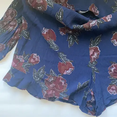 Revolve ASTR The Label  long sleeve boho ruffle hem navy floral romper, size M