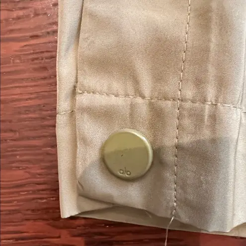 Alo Yoga  Green Airlift Game Changer Legging Side
Button Pants (from knee down)