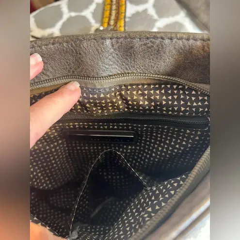 Antik Kraft Brown and Yellow Crossbody Bag with Tassel Detail and guitar strap