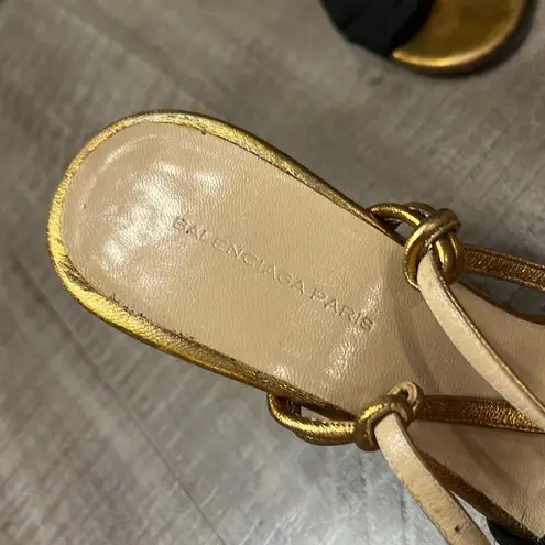 Balenciaga women’s gently used black and gold strappy sandals