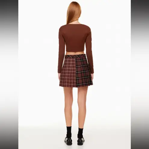 pale yellow Aritzia Sunday Best zip up long sleeve crop/corset