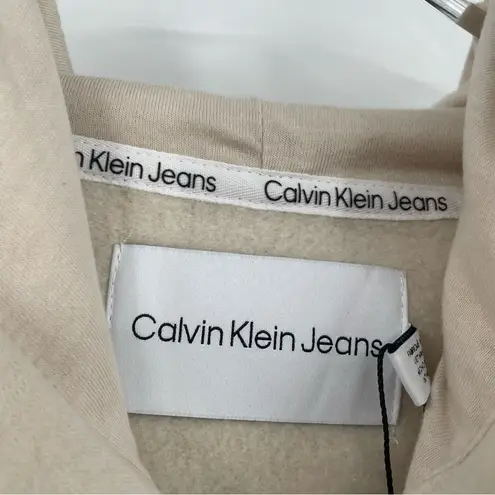 Calvin Klein Jeans Calvin Klein Airbrushed Monogrammed Logo Cropped Raw Hem Hoodie in White Size XL