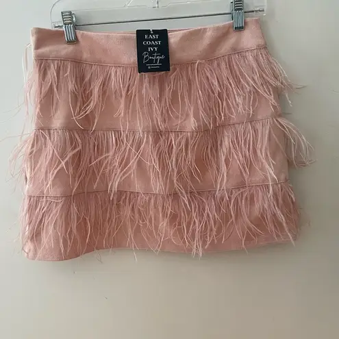Boutique pink suede ostrich feather mini skirt