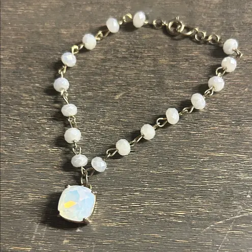This is a moonstone beaded bracelet with a cushion