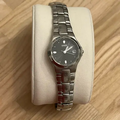 Citizen Eco-Drive Ladies Watch Black Dial WR100 Date Window Stainless Bracelet