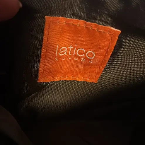 LATICO BRAND BROWN PEBBLED LEATHER WRISTLET WITH COLORFUL RIBBON
ADORABLE