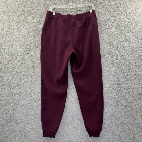 Lululemon  On the Fly Jogger Woven Cassis Maroon Red Women's 8 x 28