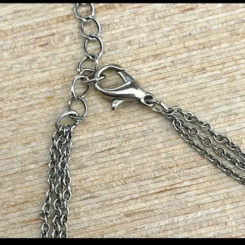 Long silver tone crystal necklace