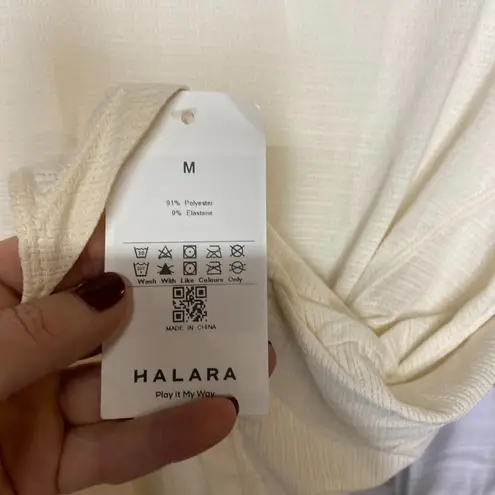 Halara NWT  Top MEDIUM Babys Breath Sheer Asymmetrical Slit Casual Relaxed Modern