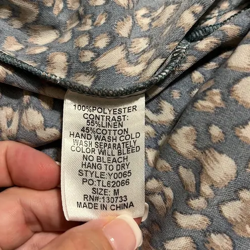 Umgee  medium leopard print skirt pockets front not lined elastic waistband NWT