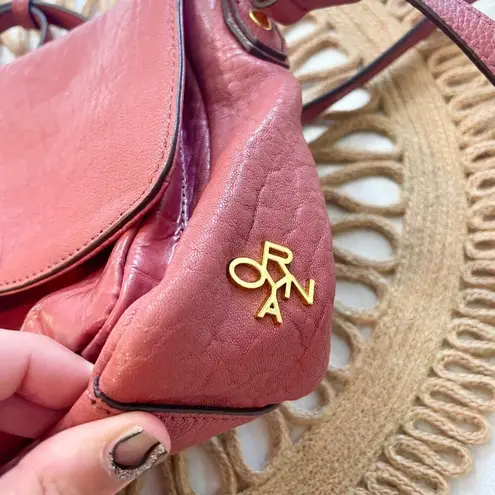 Oryany Mauve Pink Pebbled Leather Tassel Crossbody Bag