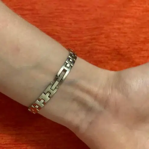 Caravelle Womens quartz movement stainless steel silver tone BY BULOVA watch