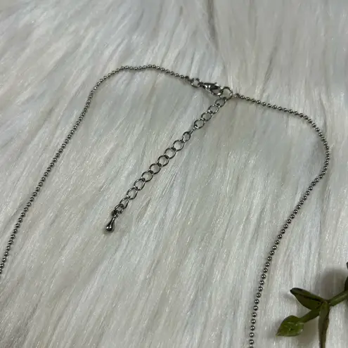 Abalone penguin heart silver tone necklace