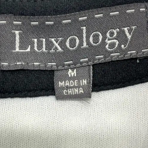 Luxology Laser Cut Out Sheath Dress W/Jeweled Round Neckline M Black/White