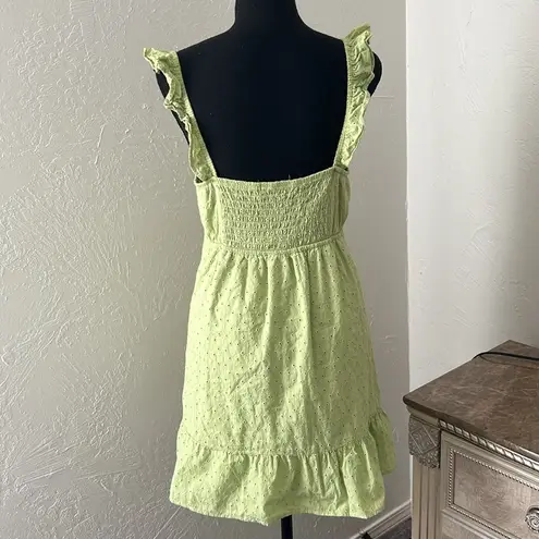 Live to be spoiled like green eyelet smocked cut out ruffle cinched mini dress