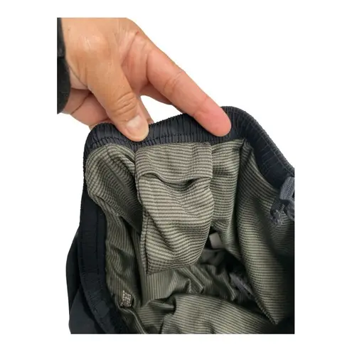 Saucony Women’s black running shorts. Size M