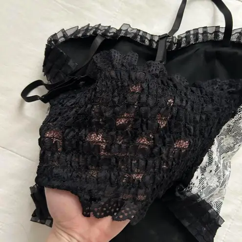 Black and white lace corset top with pearl buttons and ruffles Size XS