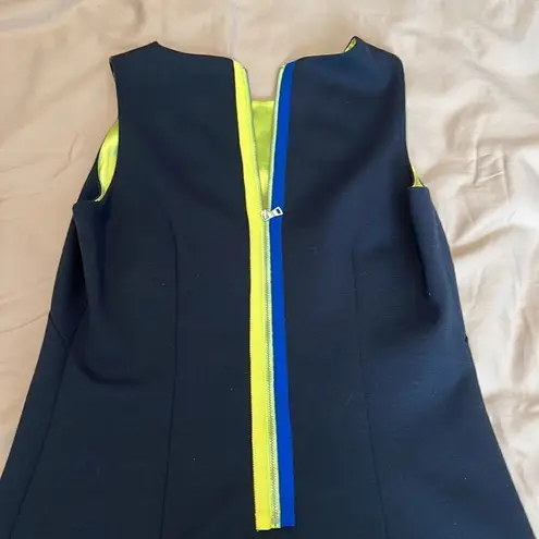 T Tahari navy blue sheath w/print band green & blue zipper & green lining