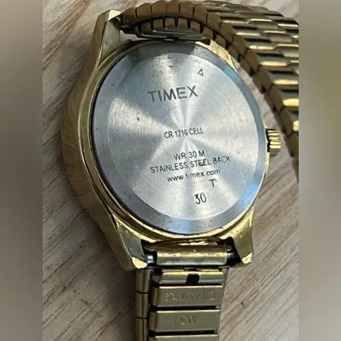 Timex Ladies Watch Indiglo Pearlescent Dial Gold Tone Stretch Band WR30M