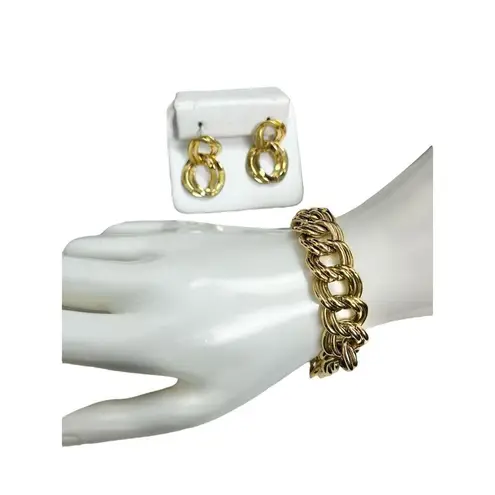 Double knotted gold toned large chain bracelet and
Matching knotted ring earrin