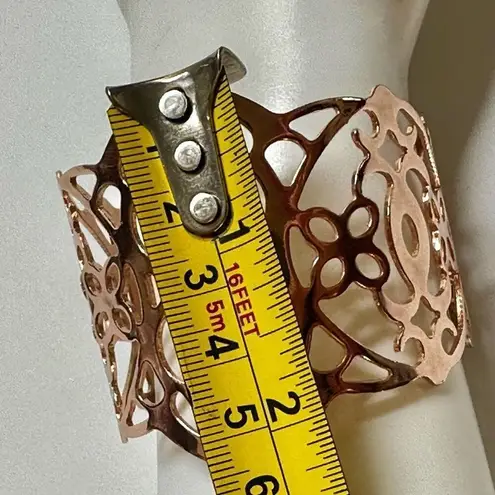 Lia Sophia gold tone cut out open cuff bracelet