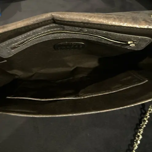 Phase 3 blue gray fold over metallic shoulder/clutch chain detail