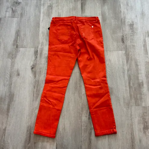 Bebe NWT  destroyed heartbreaker skinny jeans in orange