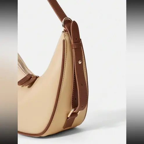 Beige handbag shoulder bag purse with brown contrast lining