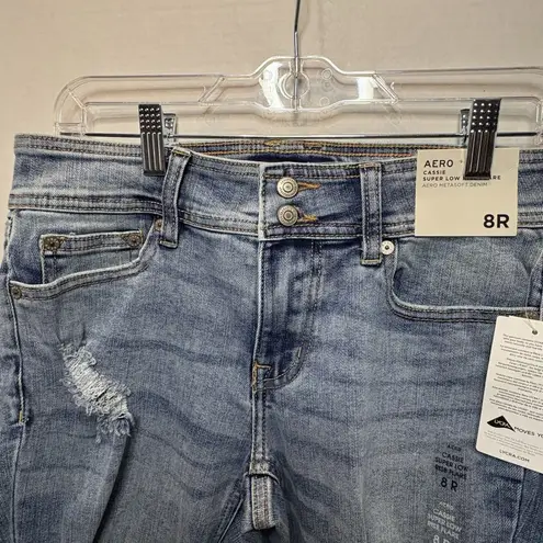Woman’s Aeropostale Cassie Super Low Rise Flare Blue Jeans Size 8R Distressed
