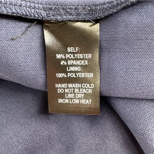 Lulu’s In the Garden Navy Blue Floral Print Romper size Large Apron Neckline