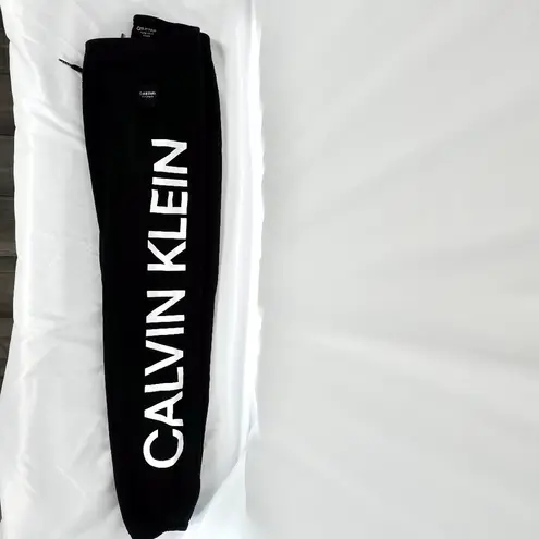 Calvin Klein |  | Cuffed Logo Print Drawstring Black Sweatpants Joggers