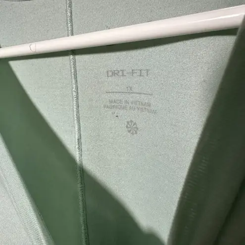 Nike  Womens Dri-FIT One Luxe Twist Front Short Sleeve Top Athletic Mint Green 1X