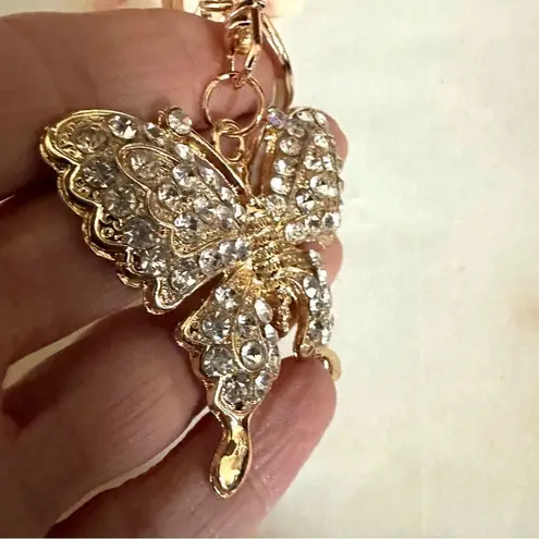 Gold tone butterfly rhinestone hang tag/keychain