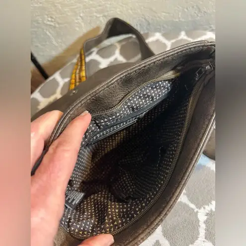 Antik Kraft Brown and Yellow Crossbody Bag with Tassel Detail and guitar strap